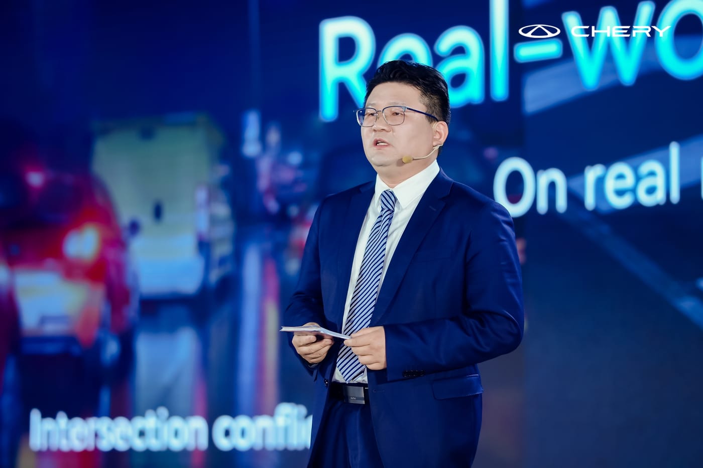 Gavin Liang Deputy General Manager of CHERY Brand delivering a speech